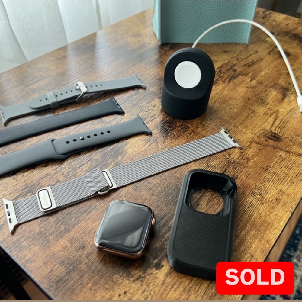 Gold Apple Watch Series 4 + Cellular, size 44mm updated to latest watchOS 10.6.1